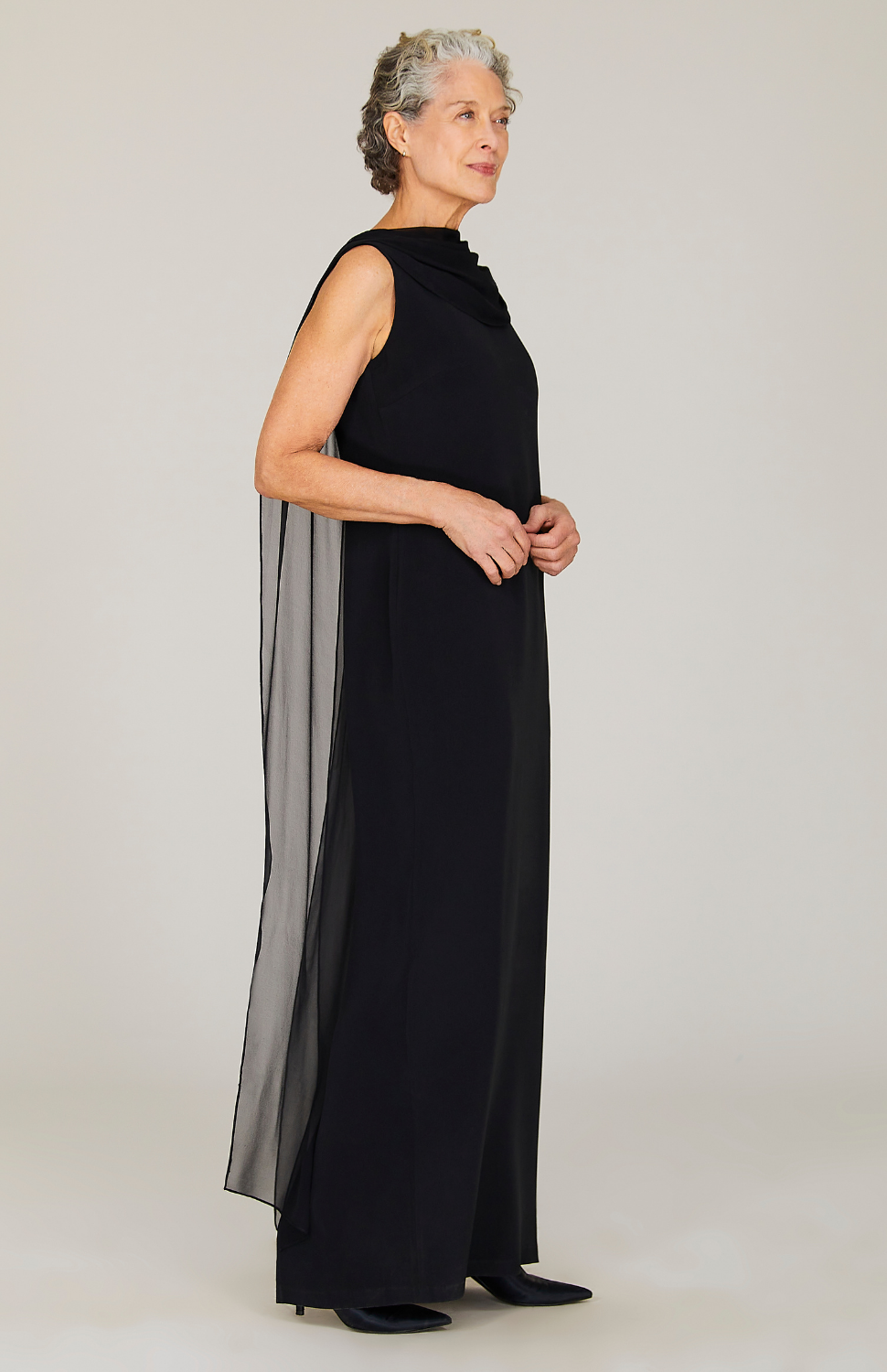 Nancy is wearing Black in size XS.