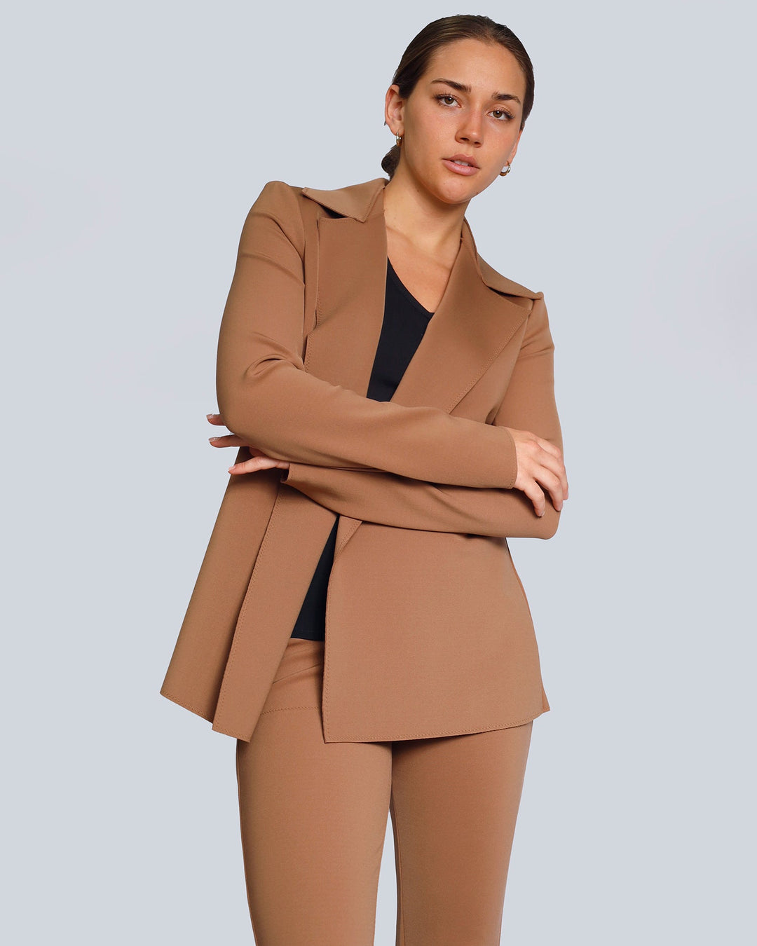 Longline blazer and slim trousers with snakeskin boots
