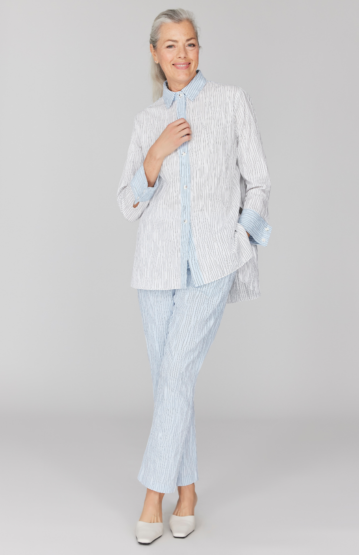 Fabienne is 5' 9" and wearing Blue in size XS.