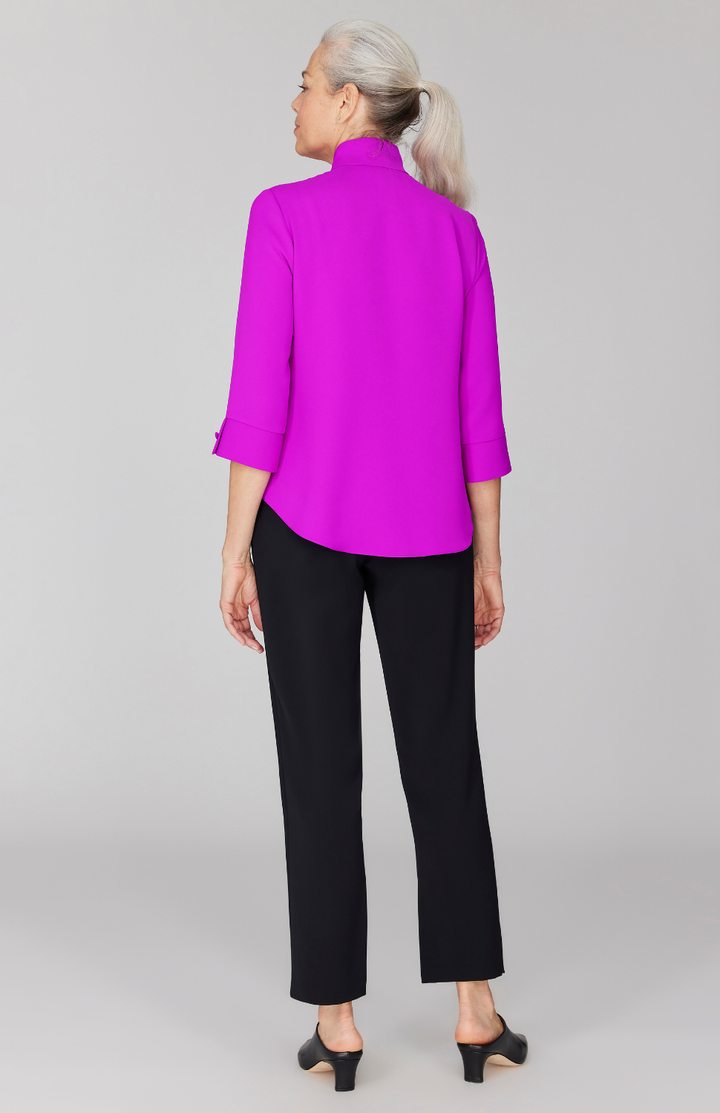 Fabienne is 5' 9" and wearing Magenta in size XS.