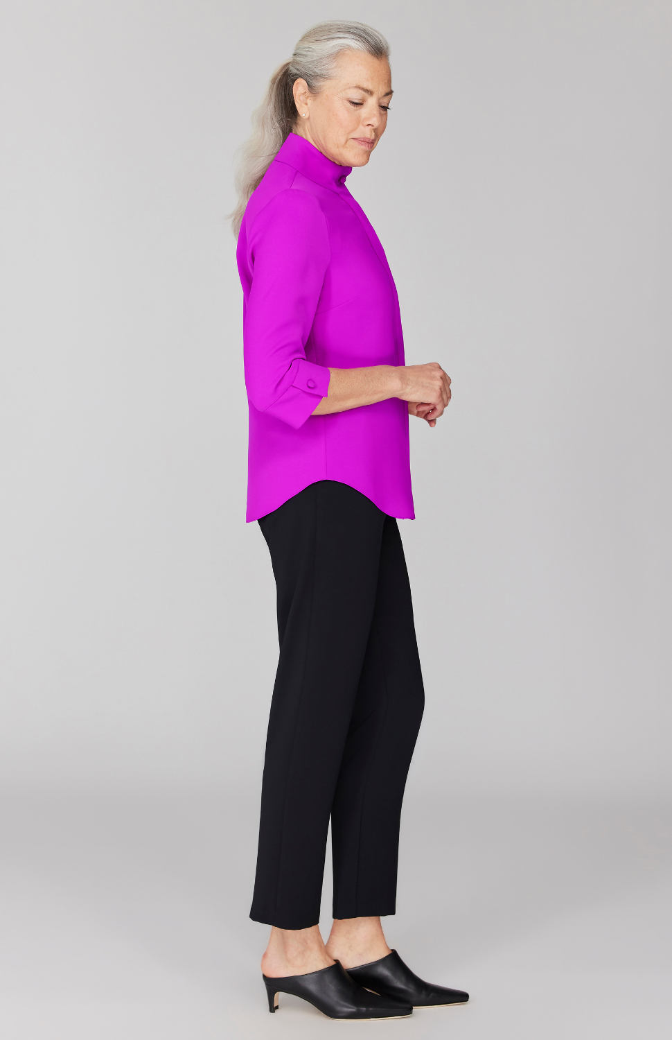 Fabienne is 5' 9" and wearing Magenta in size XS.