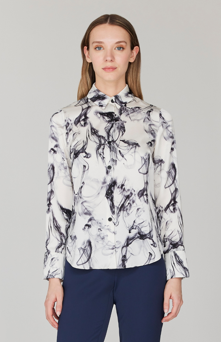 Morgan is 5' 11" and wearing Black and White in size XS.