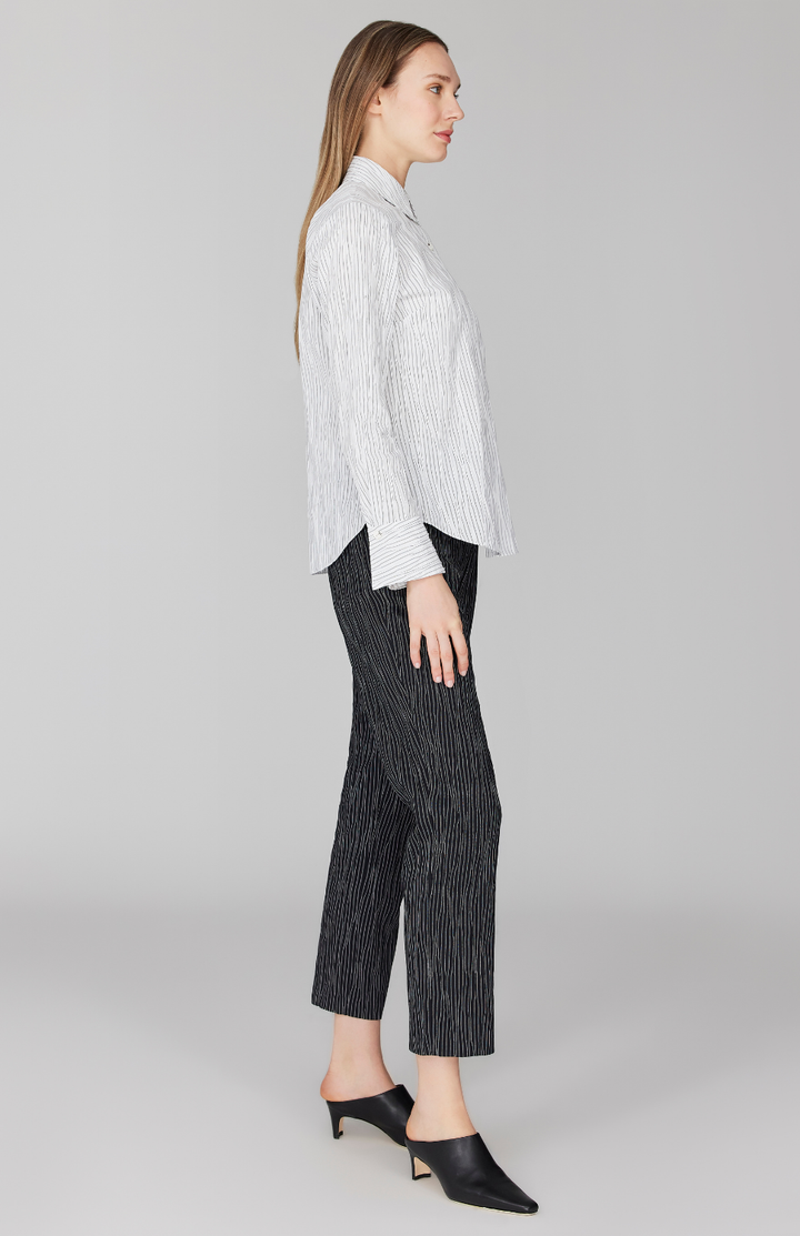 Morgan is 5' 11" and wearing White in size XS.