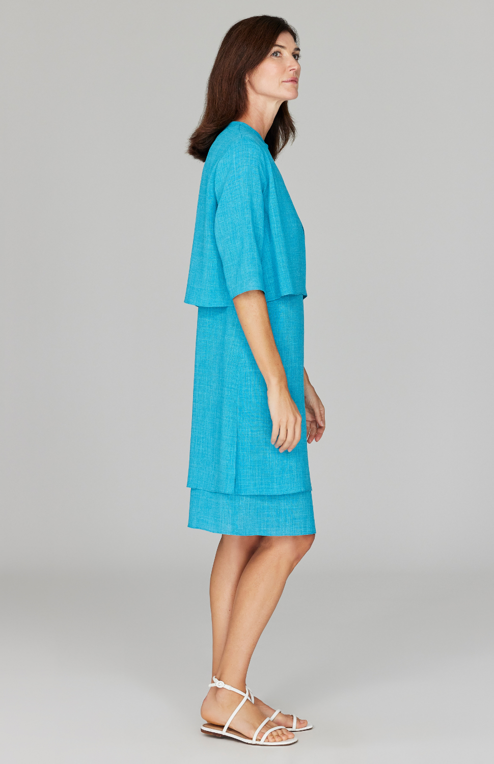 Ekaterina is 5'10" and is wearing a size XS in Cyan.