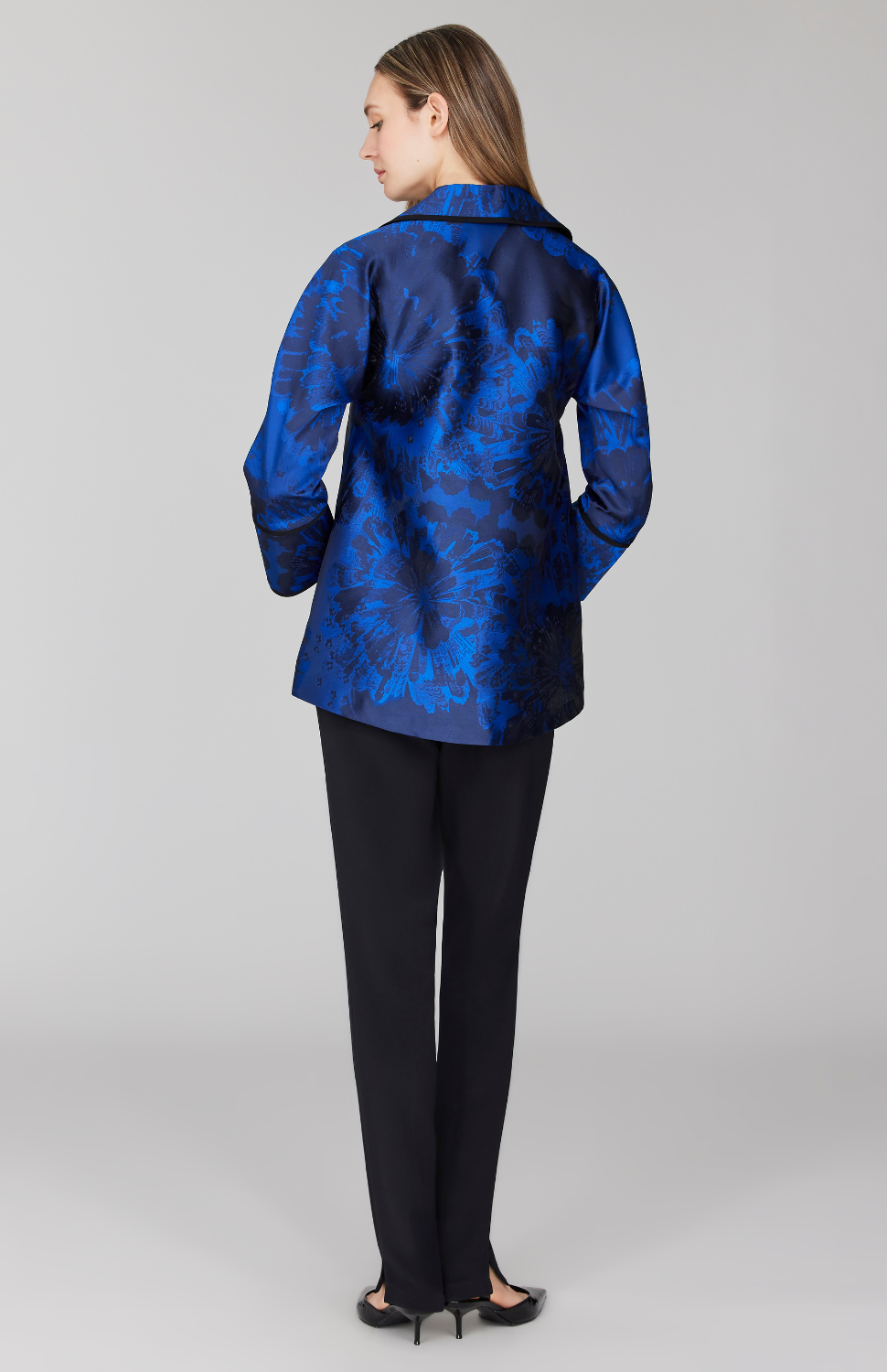 Morgan is 5' 11" and wearing Blue in size XS.