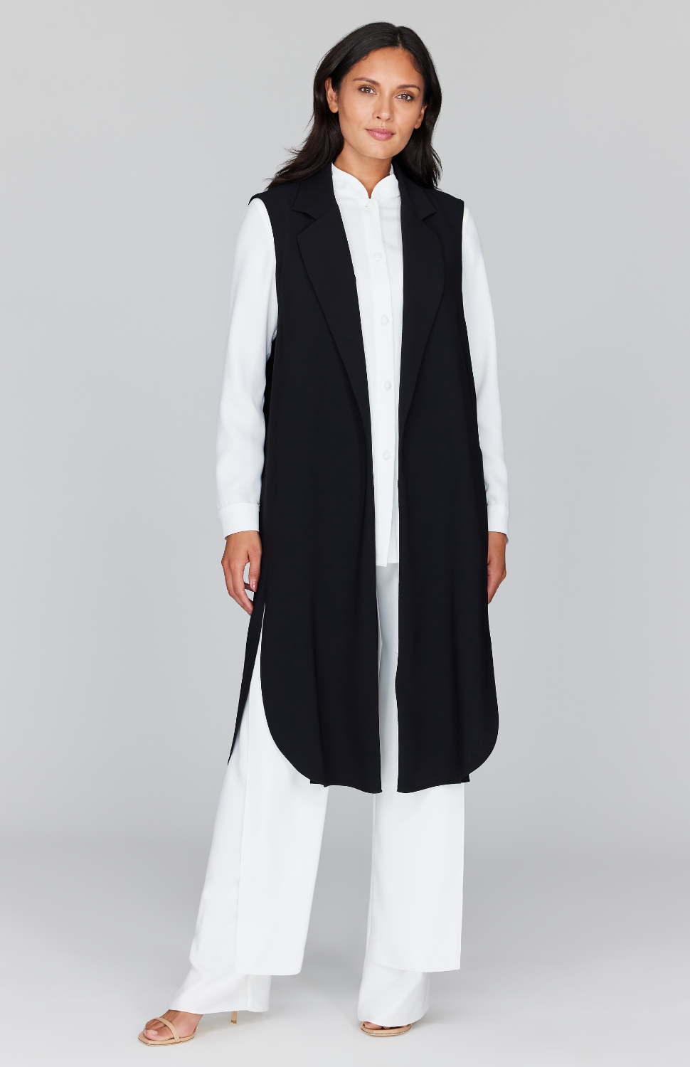 Chelsea is wearing Black in size XS.