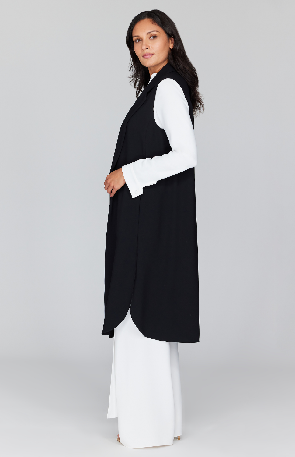 Chelsea is wearing Black in size XS.