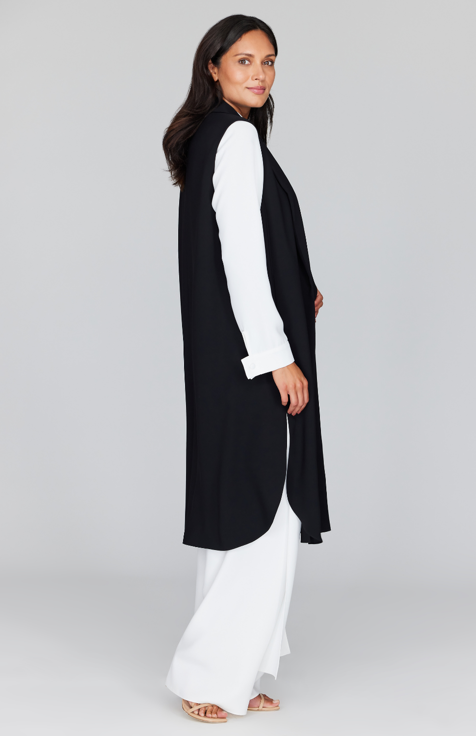 Chelsea is wearing Black in size XS.