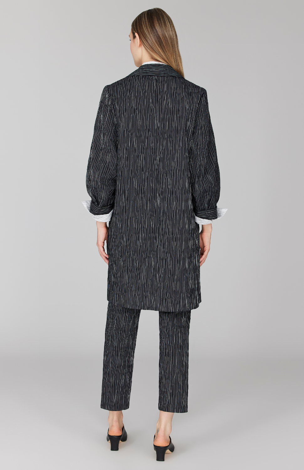 Morgan is 5' 11" and wearing Black in size XS.