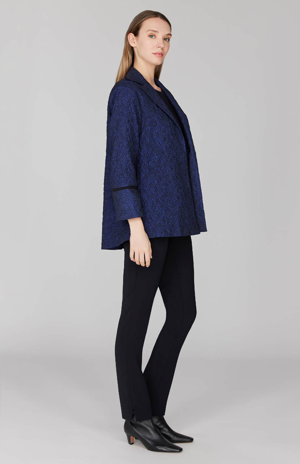 Morgan is 5' 11" and wearing Marine in size XS.