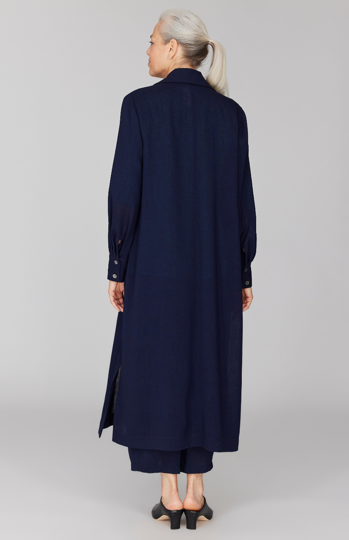 Fabienne is 5' 9" and wearing Midnight in size XS.