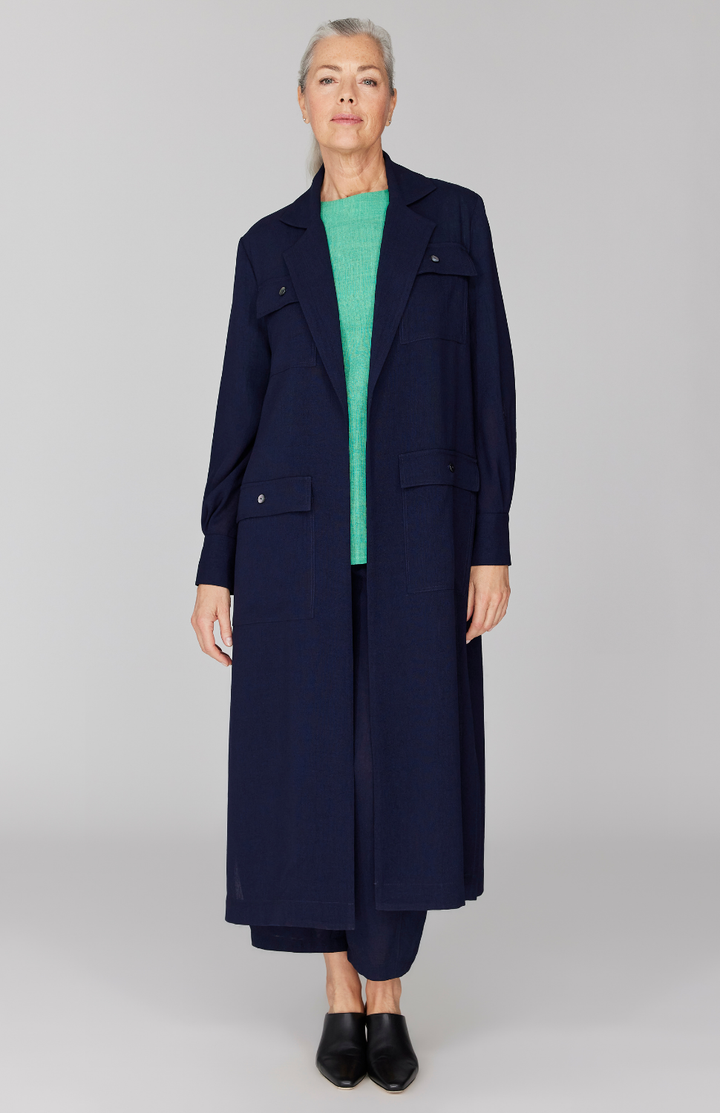 Fabienne is 5' 9" and wearing Midnight in size XS.