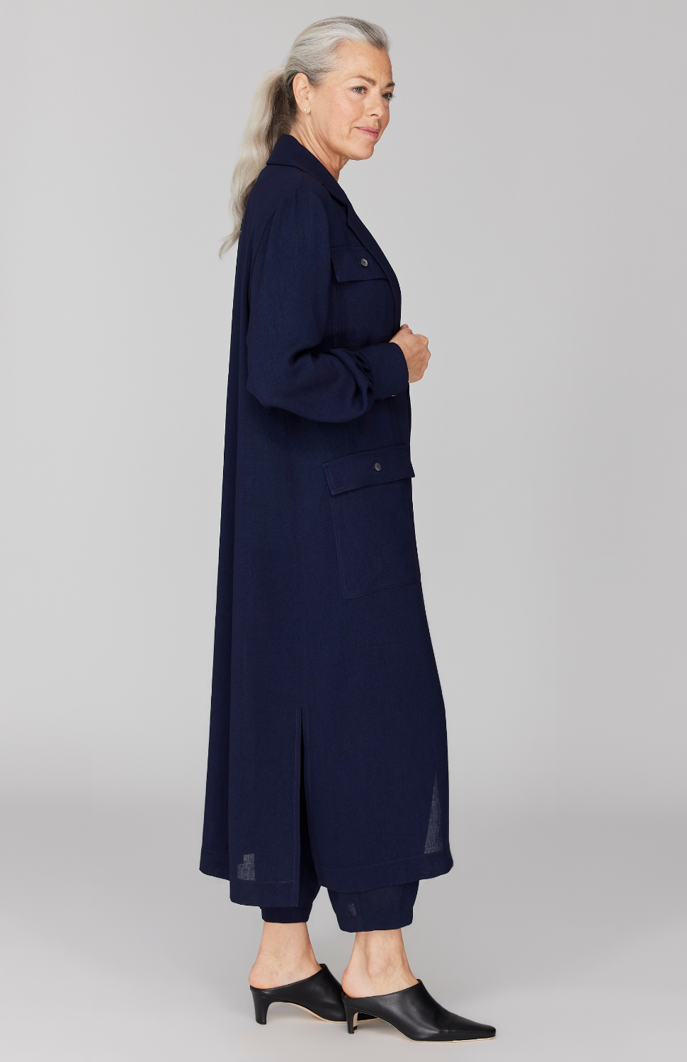 Fabienne is 5' 9" and wearing Midnight in size XS.