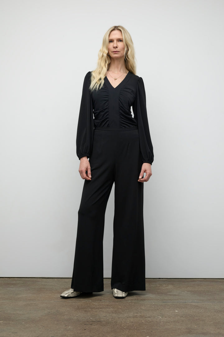 Long sleeve top with roushing