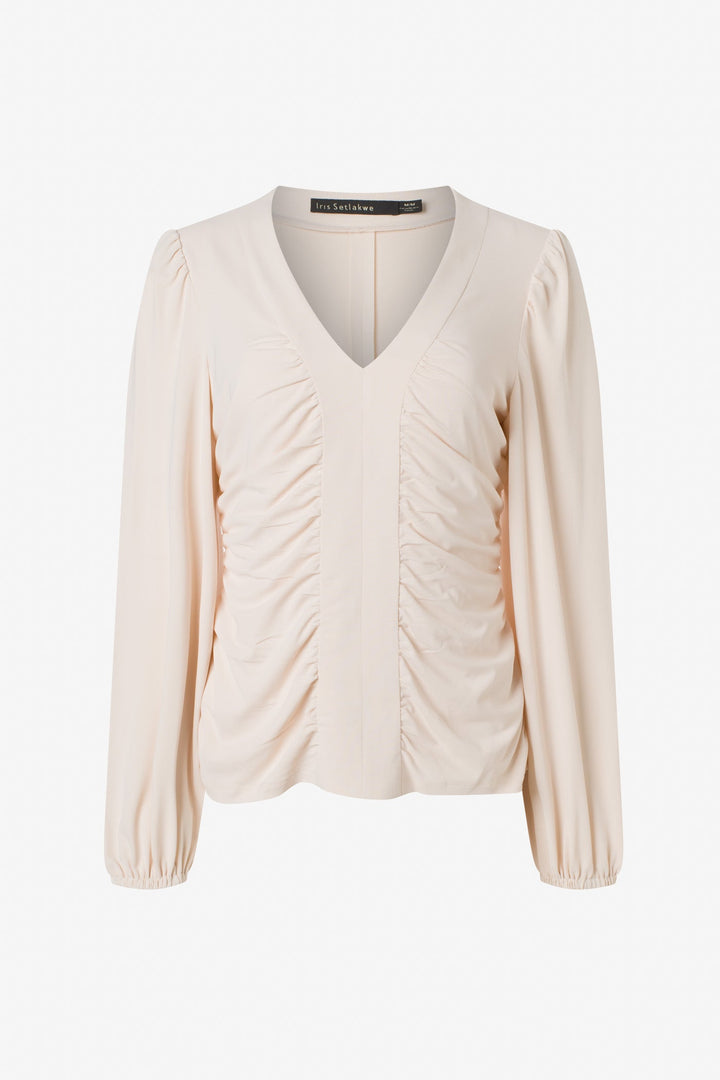 Long sleeve top with roushing