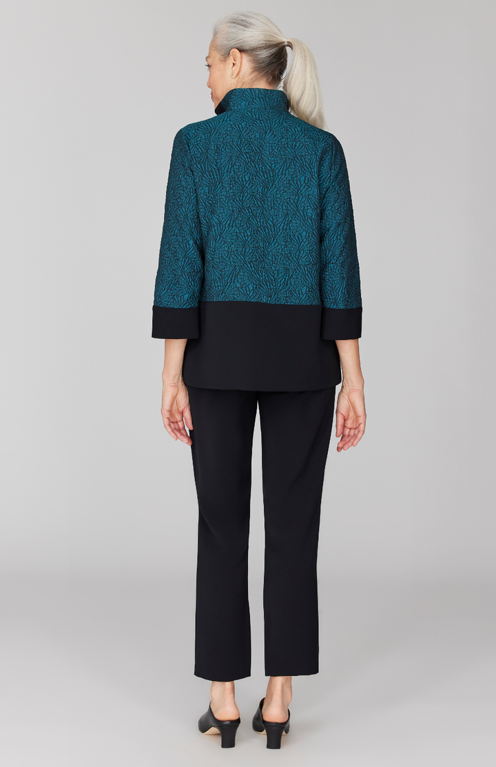 Fabienne is 5' 9" and wearing Turquoise in size XS.