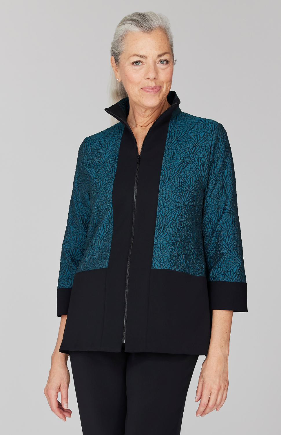 Fabienne is 5' 9" and wearing Turquoise in size XS.