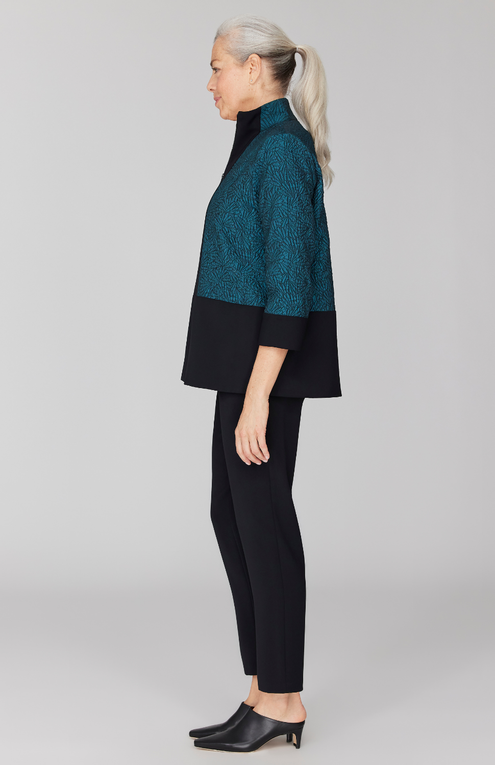 Fabienne is 5' 9" and wearing Turquoise in size XS.