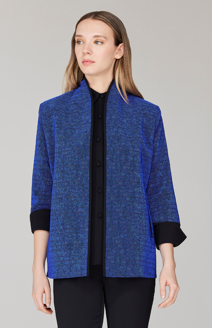 Morgan is 5' 11" and wearing Blue in size XS.