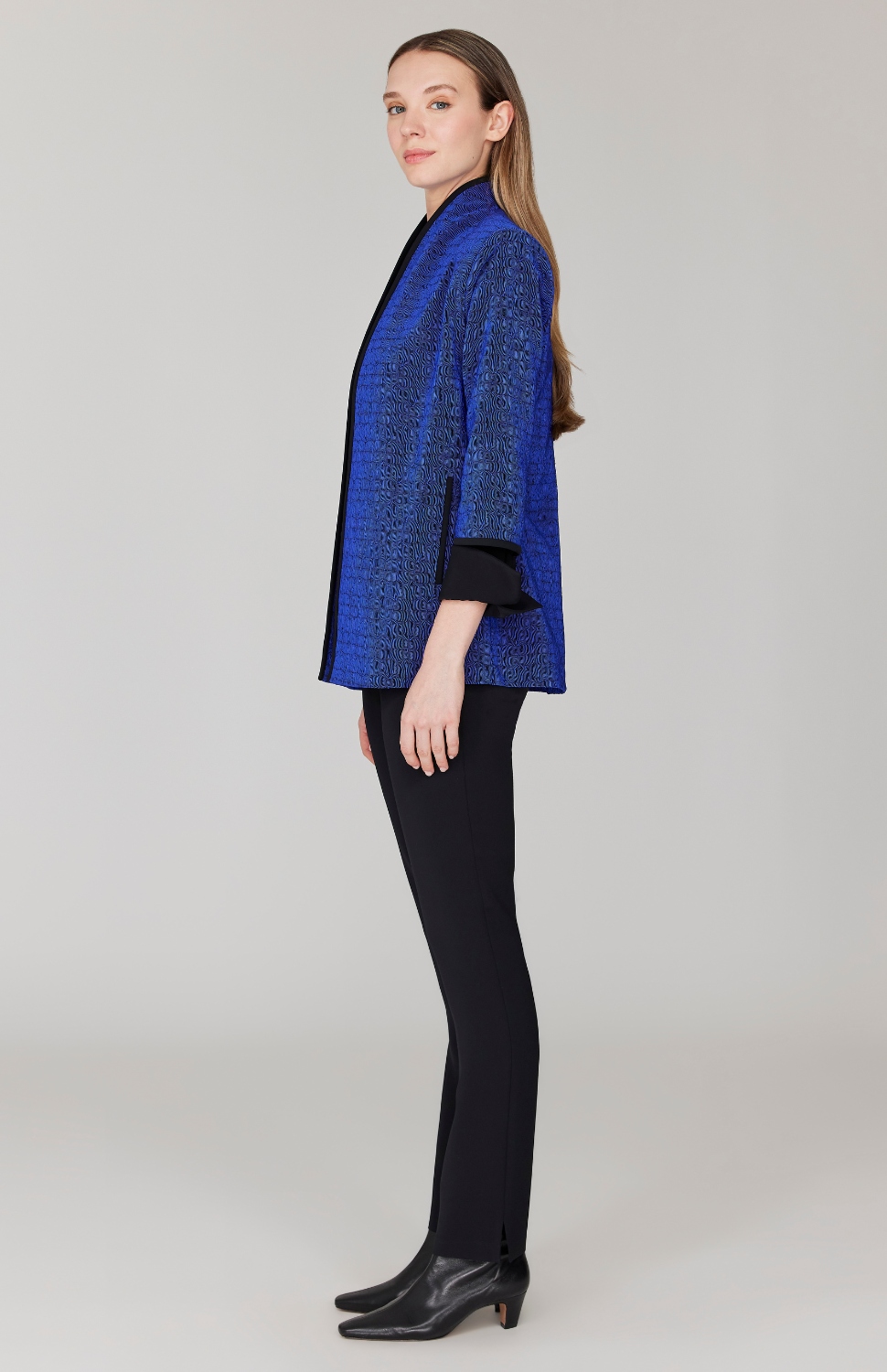 Morgan is 5' 11" and wearing Blue in size XS.