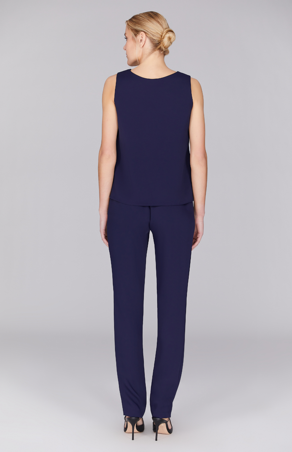 Gabby is 5’ 10" and wearing Midnight in XS.