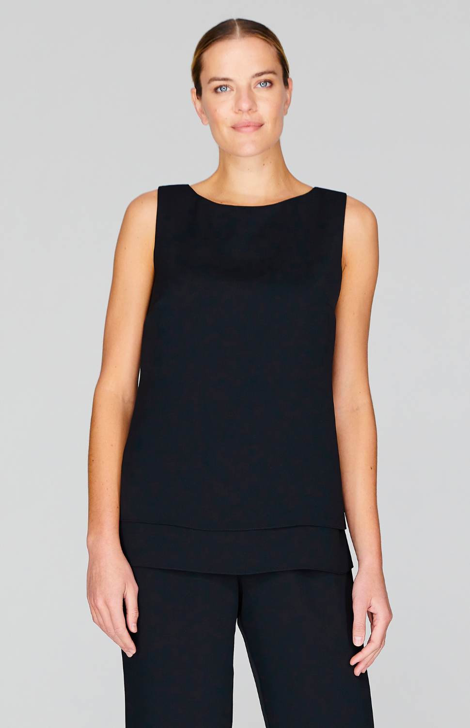 Gabby is wearing Black in size XS.