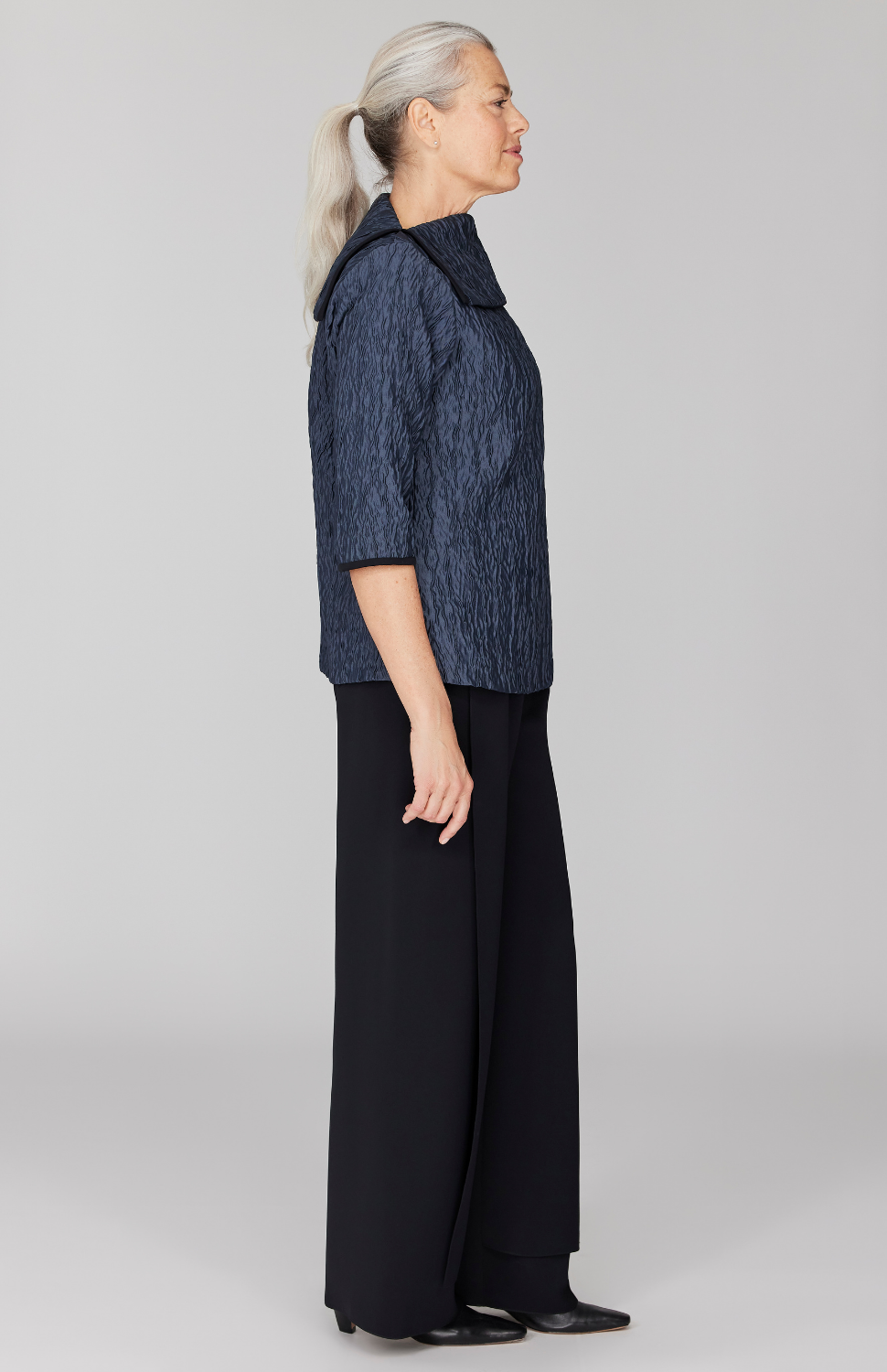 Fabienne is 5' 9" and wearing Storm in size XS.