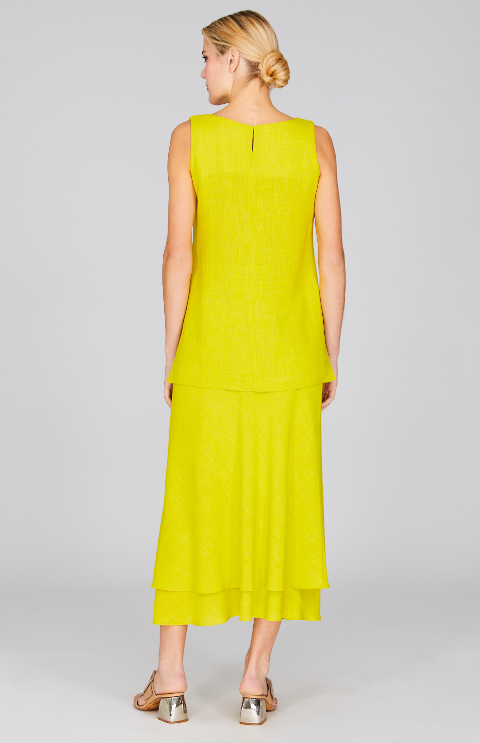 Gabby is 5' 10" wearing Citrus in XS.