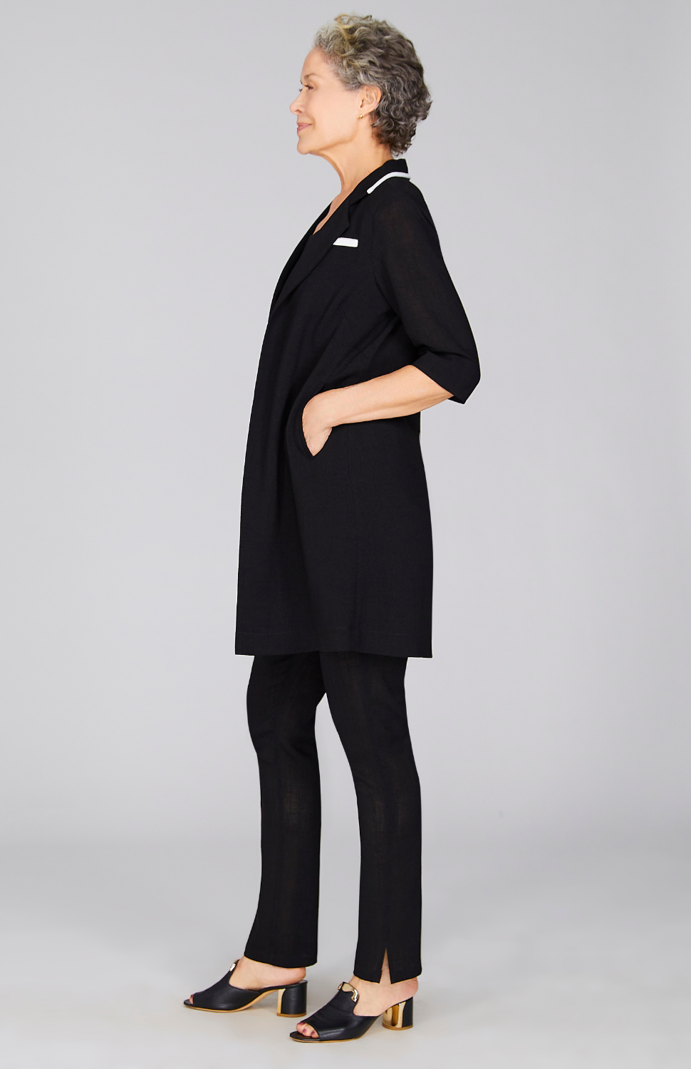 Nancy is wearing Black in size XS.