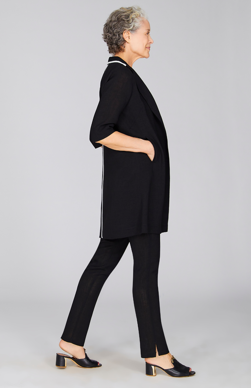 Nancy is wearing Black in size XS.